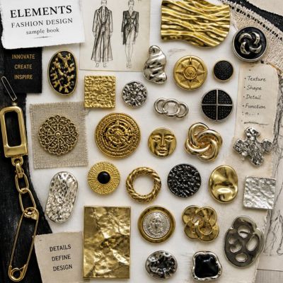 Campionario di bottoni e accessori metallici per la moda
